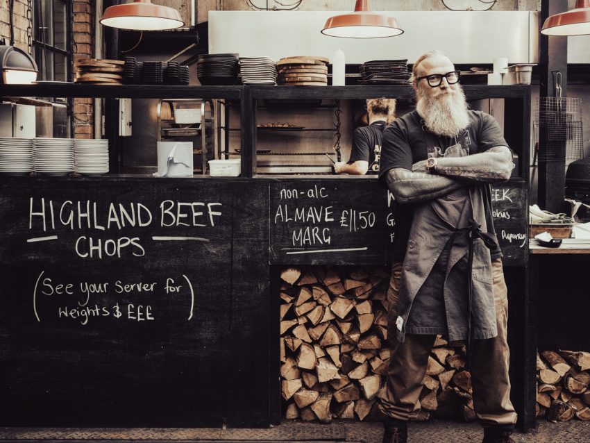 Full Length corporate portrait of chef Andrew Clarke on site in London with natural lighting and shot on Hasselblad